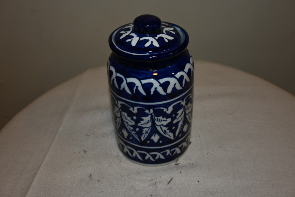 Blue pottery cooki jar  size 4x6"