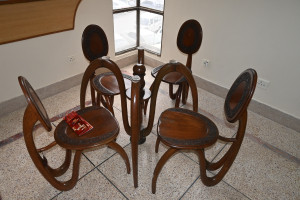 Wooden dining table set with 4 chairs compleat with glass spider design