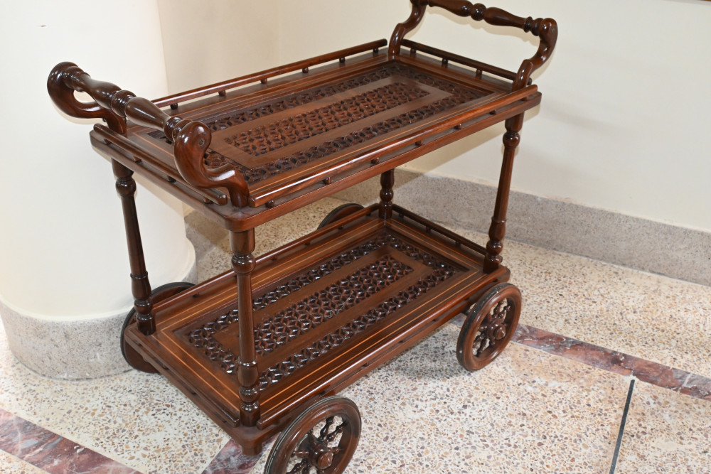 Wooden tea trolley with cut work